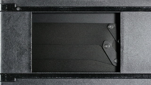 35mm camera curtain, shutter released. Green screen.