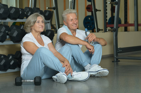 beautiful elderly couple in gym