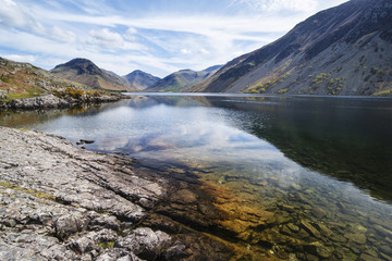 Naklejka na ściany i meble Stunning landscape of Wast Water with reflections in calm lake w