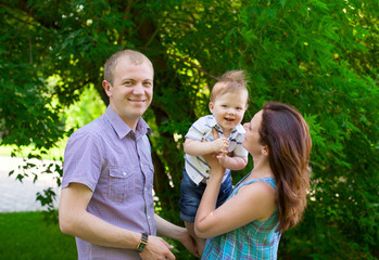 Naklejka premium Happy family outdoors