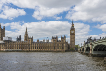 Fototapeta na wymiar View of Big Ben and Houses of Parliament in London across Thames