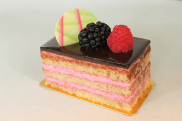  chocolate  and pink decorated pastries  cakes and slices of cak