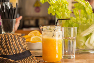 fresh orange juice and holiday hat
