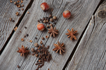   Carnation, fragrant pepper, wood nut and anise asterisks on a