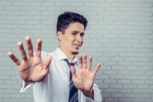 Businessman expressing aversion