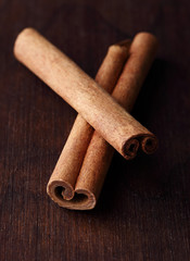 cinnamon on a wooden background