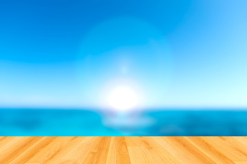Wooden paving and blurred sea and sky background