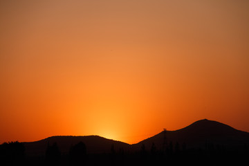 Mountain silhouette at sunset