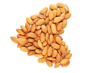 Heart from almonds isolated on white