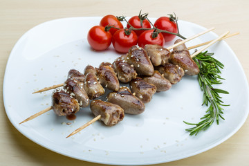 Grilled chicken hearts barbecue