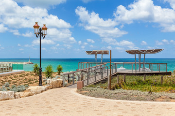 Obraz na płótnie Canvas View on Mediterranean sea from promenade in Israel.