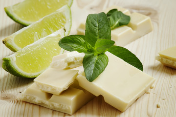 White chocolate with mint and lime, selective focus