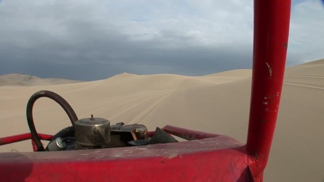 trip with a buggy in dunes. Huacachina, Ica, Peru