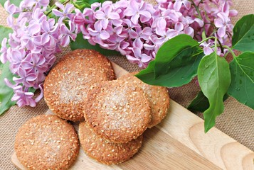 fresh homemade baked cookies for breakfast with flowers on table