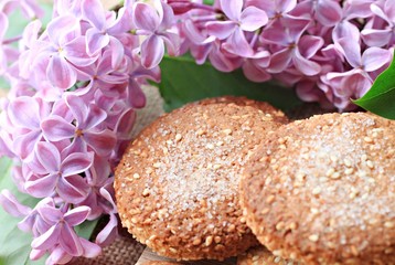 fresh homemade baked cookies for breakfast with flowers on table