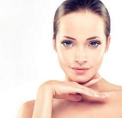 Beautiful Young Woman with Clean Fresh Skin close up
