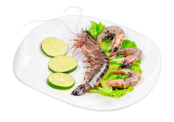 Raw shrimps on plate.