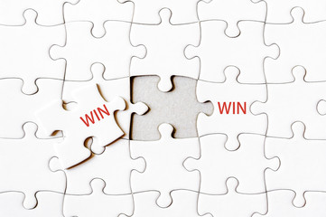 Missing jigsaw puzzle piece completing word WIN WIN