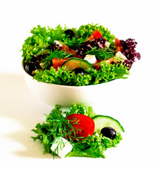 Greek salad in white bowl 
