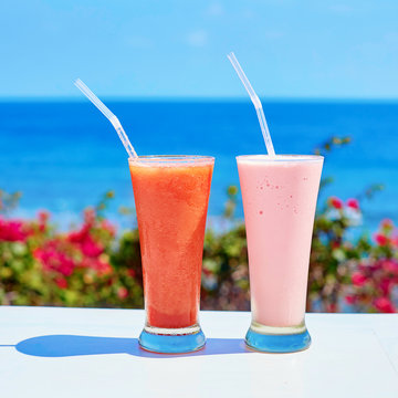 Two fresh juices or smoothies on a tropical resort