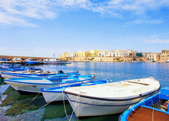 Fototapeta na wymiar Fishermen`s boats, Gallipoli, Apulia, Southern Italy