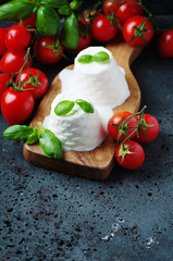 Fresh ricotta with tomato and basil