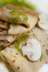 Crepes with the chicken, mushroom, lettuce 