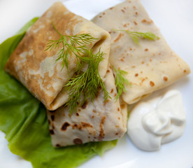 Crepes with the chicken, mushroom, lettuce 