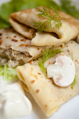Crepes with the chicken, mushroom, lettuce 