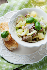 Healthy salad with octopus, celery and potato