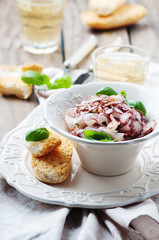 Octopus carpaccio in the table