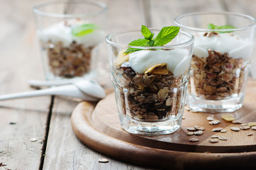 Healthy breakfast with muesli and yogurt