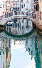 Fototapeta na wymiar The bridge over a canal in Venice. Shallow depth of field
