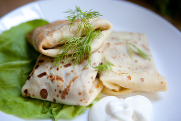 Crepes with the chicken, mushroom, lettuce 