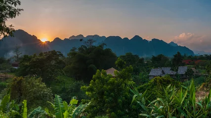 Abwaschbare Fototapete Sun set in Vang Vieng, Laos © filmlandscape