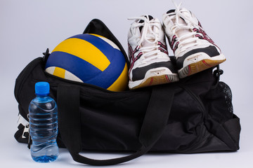 Sports bag with sportswear and ball. - 83463572