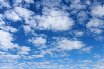 Naklejka na ściany i meble Beautiful blue sky with fluffy clouds