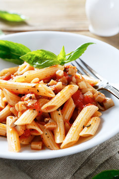 penne pasta with tomato sauce and basil