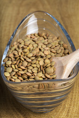 lentils in bowl on wooden table