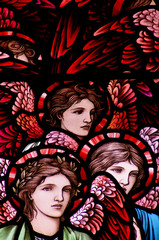 Three angels in stained glass