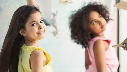 Two adorable girls playing together