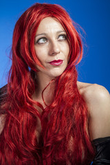 attractive woman with huge red mane, blue chroma