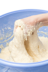 Making dough by female hands