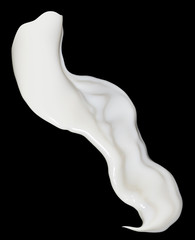 milk on a black background