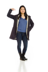 Model isolated pointing to herself