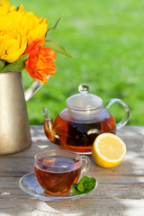 Breakfast tea on garden table