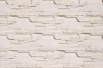 White cladding tiles imitating stones