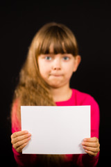 Fototapeta premium Sad girl with blank white sign
