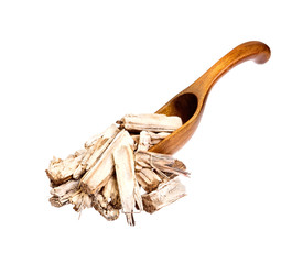 Dry Burdock on the wooden spoon.