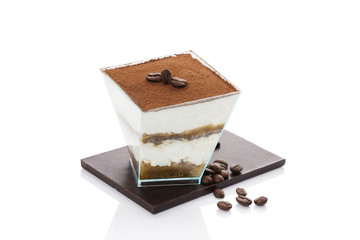 Tiramisu cake with coffee beans isolated.